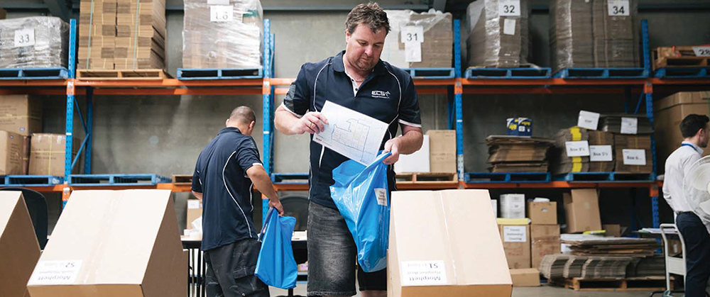 ECSA STAFF PACKING KITS TO BE DELIVERED
TO POLLING BOOTHS.